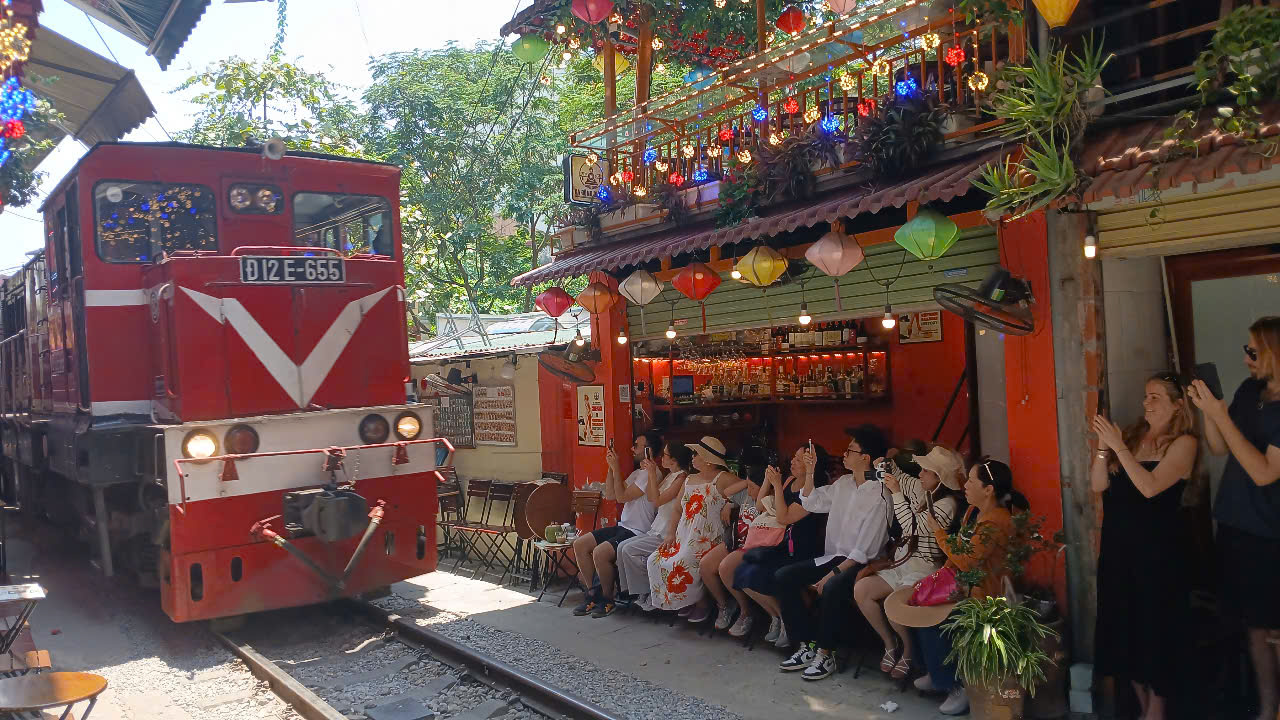 HANOI CITY TOUR:  INCENSE VILLAGE - TRAIN STREET - HOA LO PRISON - TEMPLE OF LITERATURE - HOCHIMINH MAUSOLEUM - TRAN QUOC PAGODA - EGG COFFEE image 4