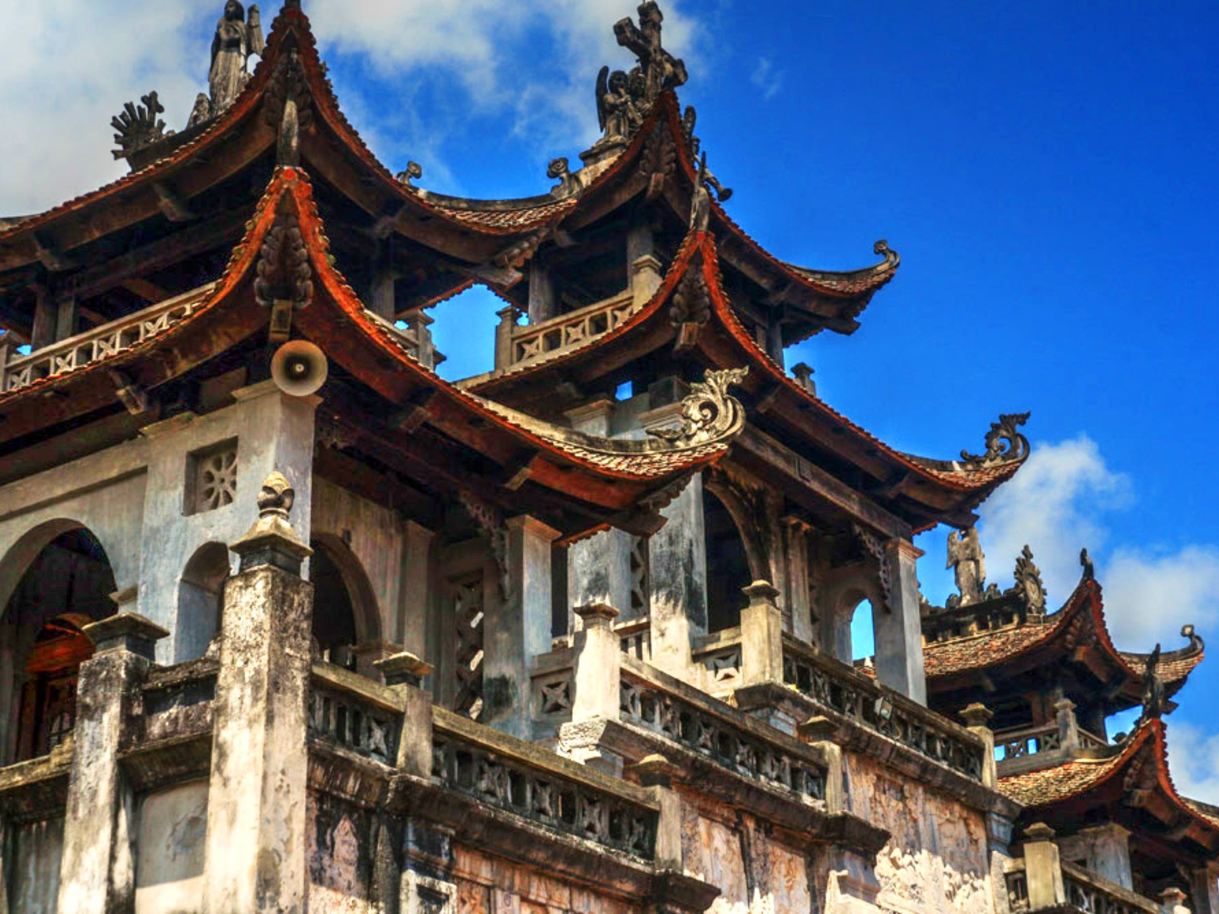 Ninh Binh: Phat Diem Stone Cathedral & Pineapple Farm Tour image 5